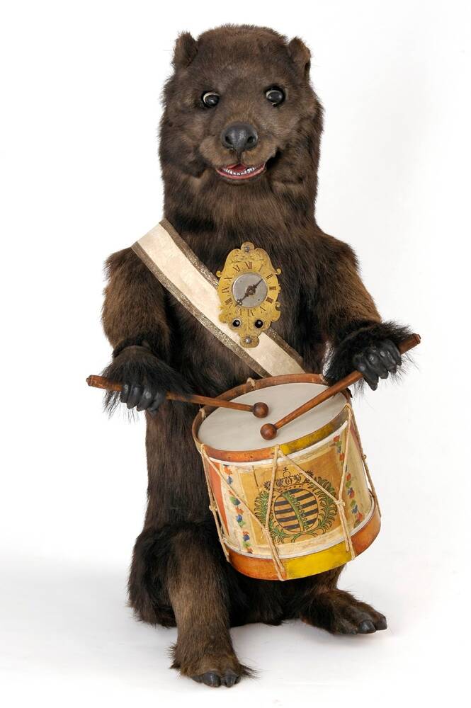 Figuren-Automatenuhr "Trommelnder Bär"